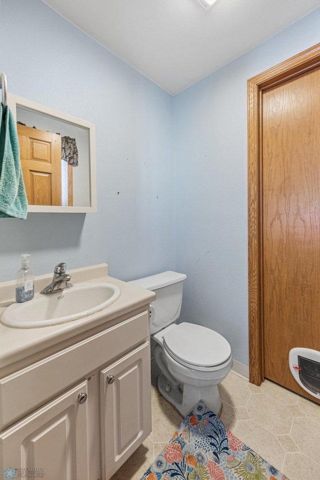 362 5th Ave N, Casselton, ND 58012 - half bathroom featuring vanity and toilet