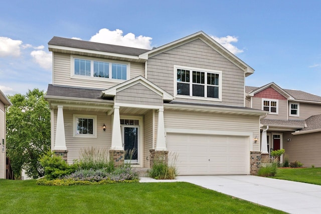 1767 Switchgrass Ct, Shakopee, MN 55379 - craftsman inspired home featuring concrete driveway, an attached garage, and a front yard