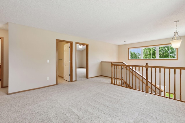 1767 Switchgrass Ct, Shakopee, MN 55379 - empty room featuring light colored carpet and a textured ceiling