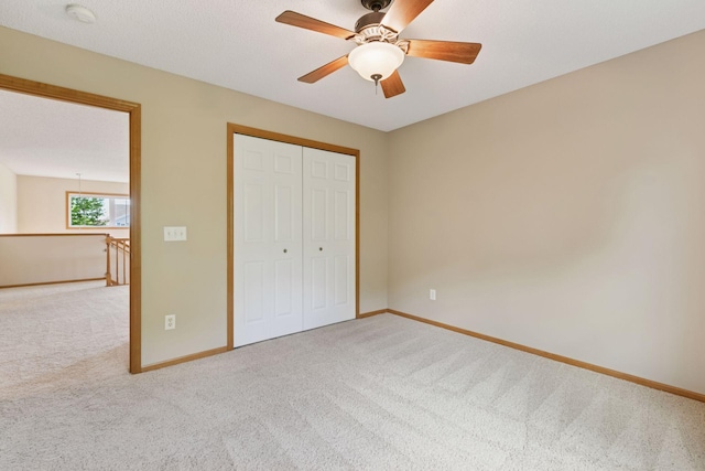 1767 Switchgrass Ct, Shakopee, MN 55379 - unfurnished bedroom featuring carpet flooring, a closet, and ceiling fan