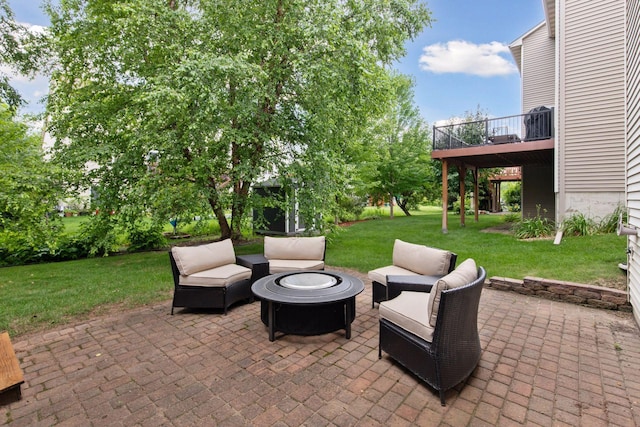 1767 Switchgrass Ct, Shakopee, MN 55379 - view of patio / terrace featuring an outdoor living space with a fire pit and a wooden deck