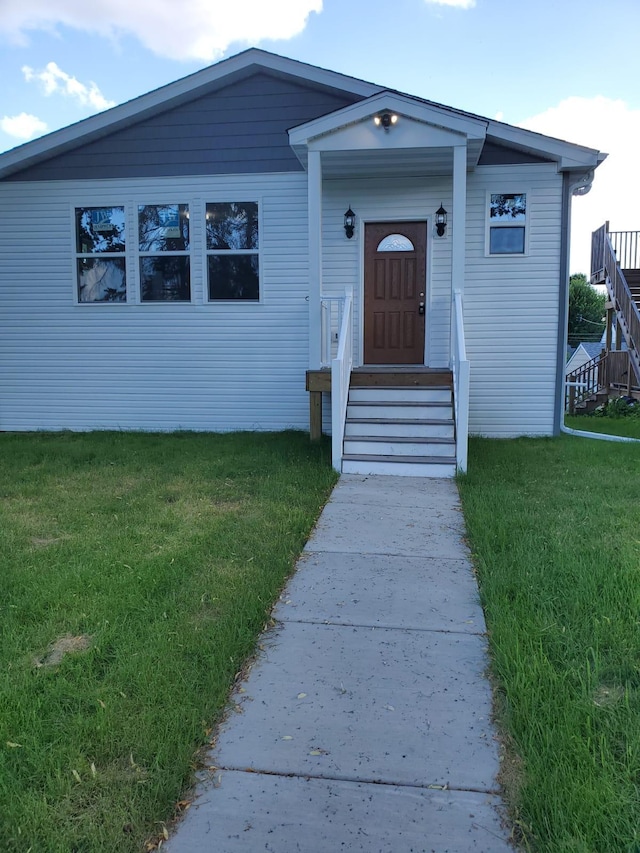 1884 Ames Ave, Saint Paul, MN 55119 - view of front of property with a front yard and entry steps