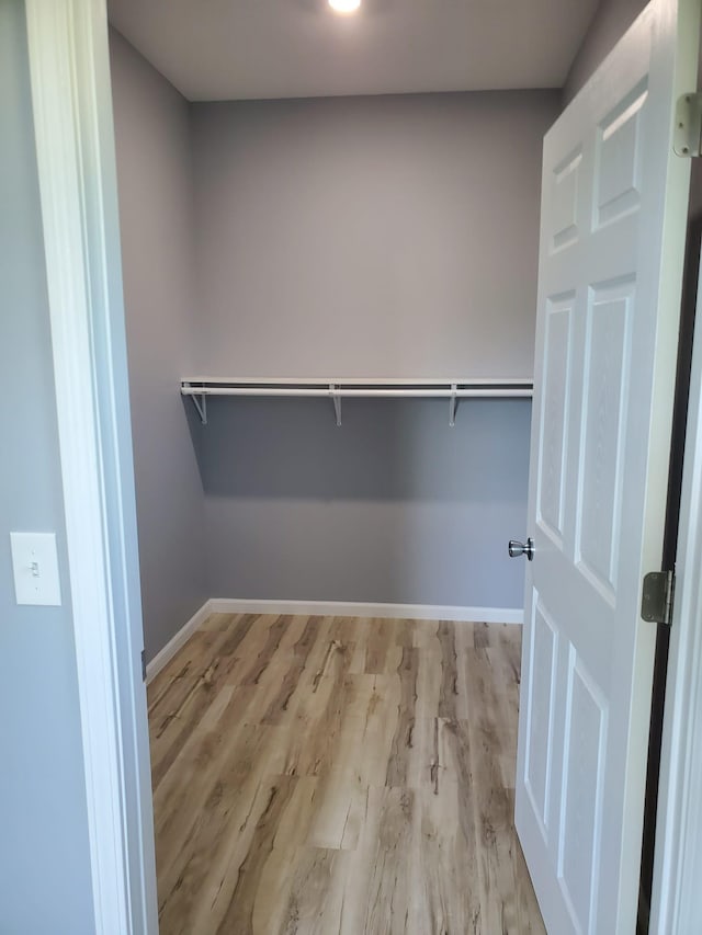 1884 Ames Ave, Saint Paul, MN 55119 - spacious closet featuring wood finished floors