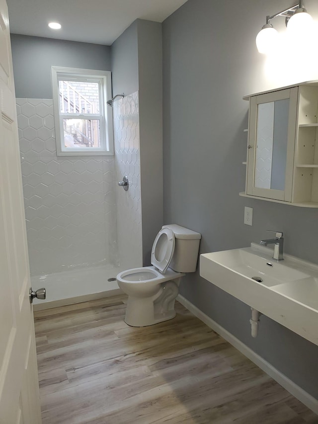 1884 Ames Ave, Saint Paul, MN 55119 - bathroom with a shower stall and wood finished floors