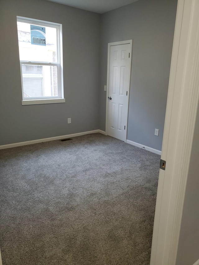 1884 Ames Ave, Saint Paul, MN 55119 - unfurnished room with carpet and baseboards