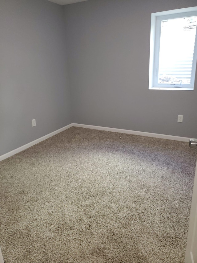 1884 Ames Ave, Saint Paul, MN 55119 - carpeted empty room featuring baseboards
