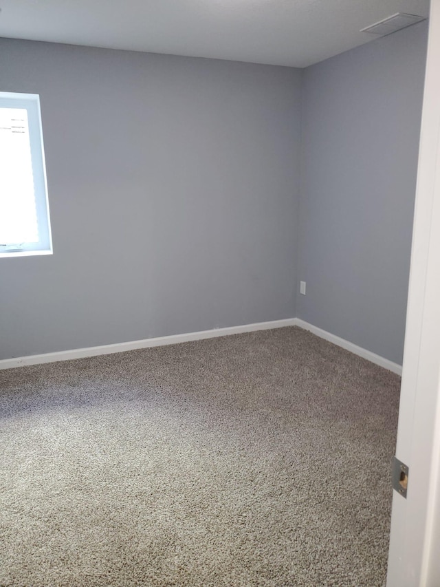 1884 Ames Ave, Saint Paul, MN 55119 - empty room featuring baseboards and carpet flooring