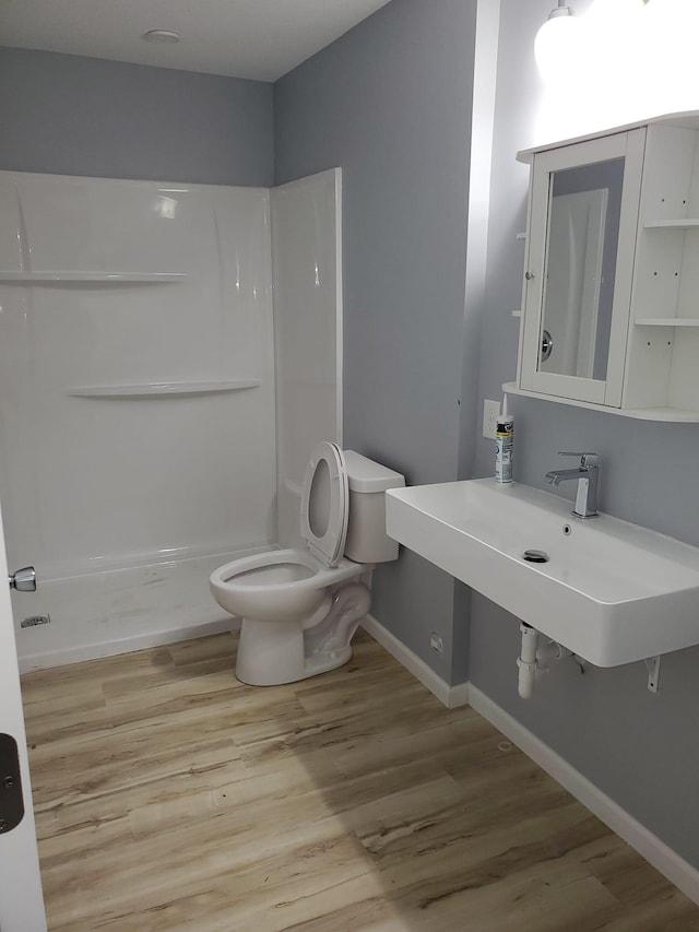 1884 Ames Ave, Saint Paul, MN 55119 - full bath with wood finished floors and a stall shower