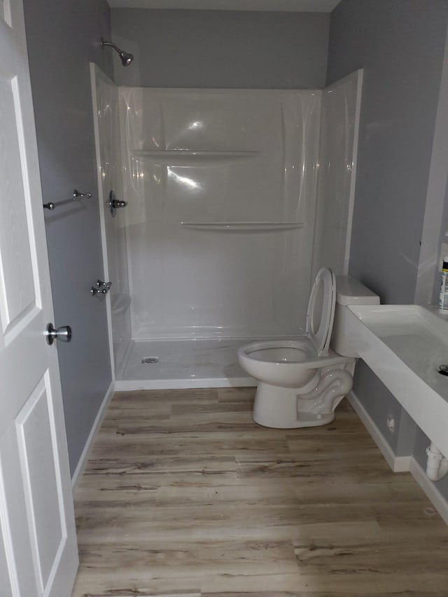 1884 Ames Ave, Saint Paul, MN 55119 - bathroom with wood finished floors, walk in shower, and vanity