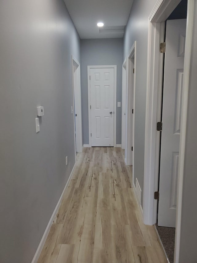 1884 Ames Ave, Saint Paul, MN 55119 - corridor featuring light wood-style flooring and baseboards