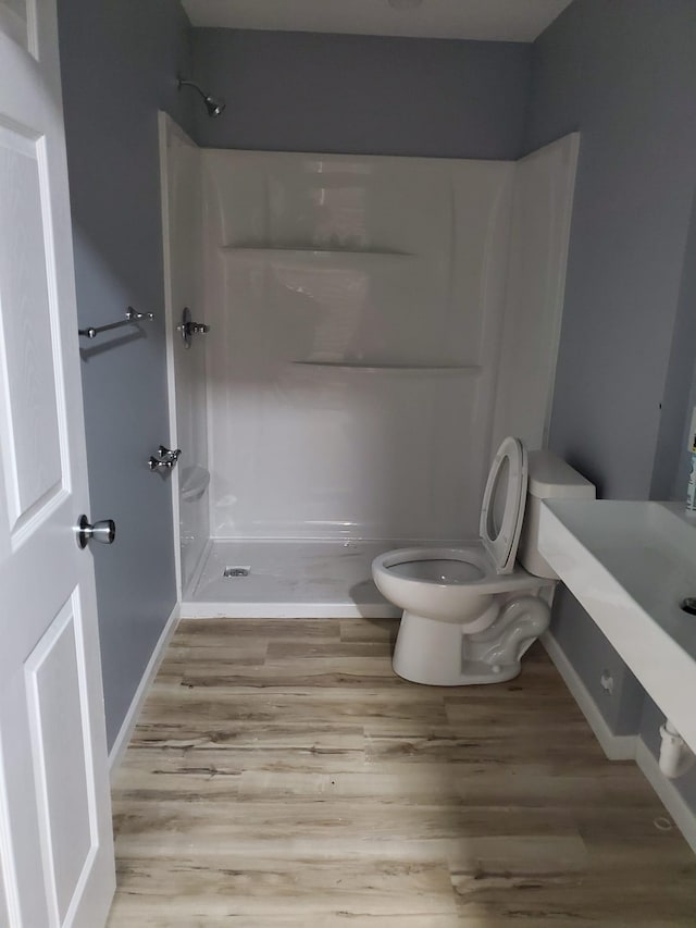 1884 Ames Ave, Saint Paul, MN 55119 - full bath featuring wood finished floors, a shower, and vanity