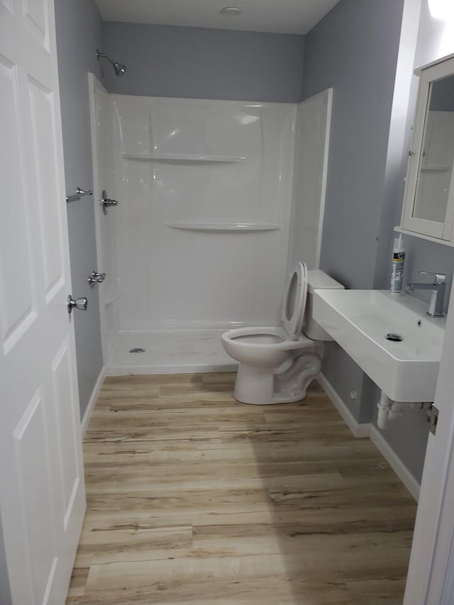 1884 Ames Ave, Saint Paul, MN 55119 - full bath featuring a shower and wood finished floors