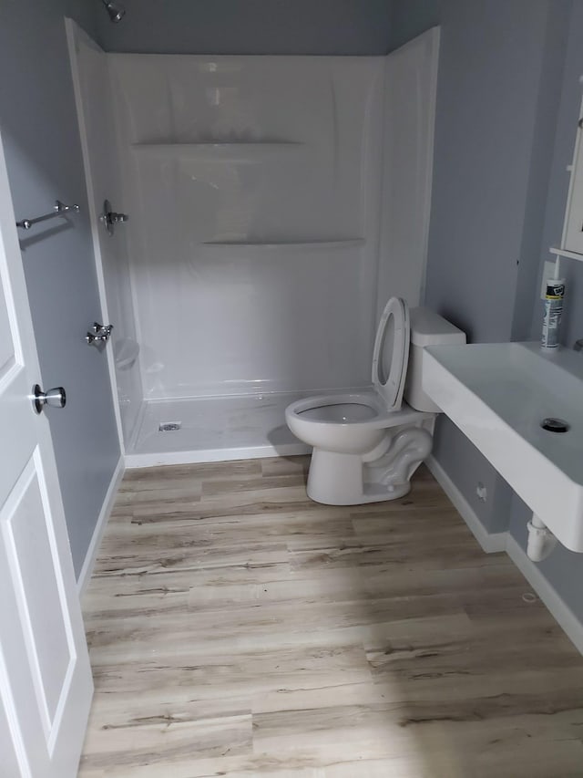 1884 Ames Ave, Saint Paul, MN 55119 - full bath with wood finished floors and a shower stall