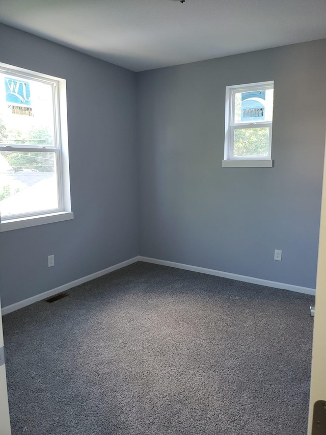 1884 Ames Ave, Saint Paul, MN 55119 - empty room with baseboards and carpet flooring