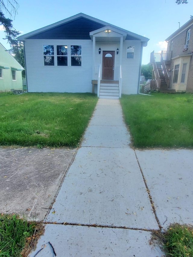 1884 Ames Ave, Saint Paul, MN 55119 - view of front of house featuring a front yard