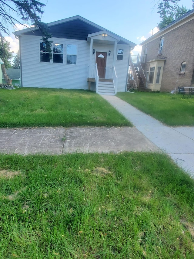 1884 Ames Ave, Saint Paul, MN 55119 - view of front facade featuring a front yard