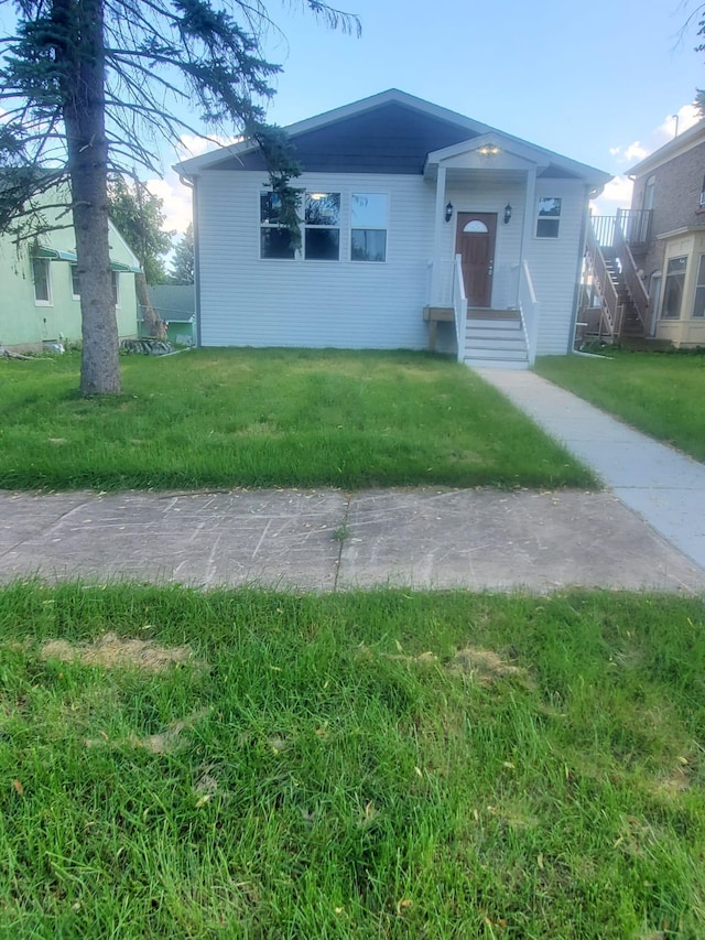 1884 Ames Ave, Saint Paul, MN 55119 - view of front facade featuring a front yard