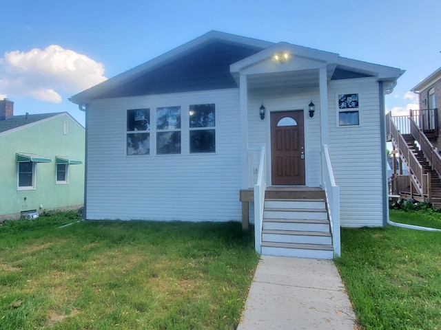 1884 Ames Ave, Saint Paul, MN 55119 - bungalow-style house with a front yard