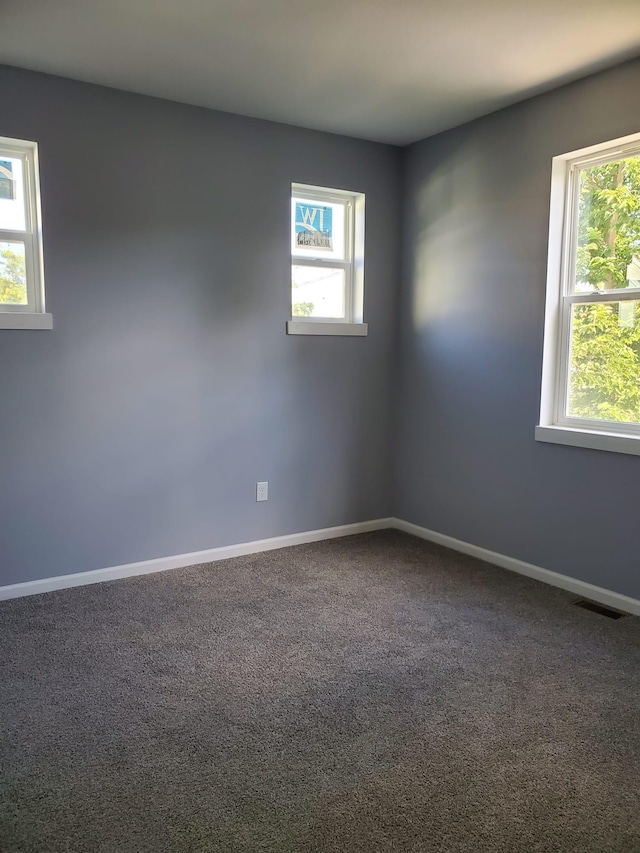 1884 Ames Ave, Saint Paul, MN 55119 - carpeted empty room with baseboards