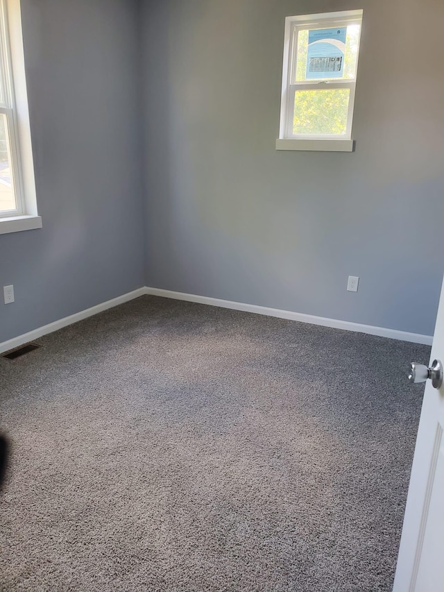 1884 Ames Ave, Saint Paul, MN 55119 - carpeted spare room with baseboards