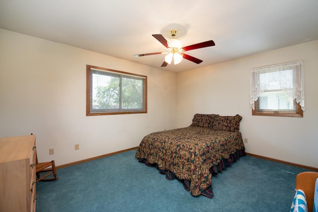 608 Pfau St, Mankato, MN 56001 - bedroom with multiple windows, carpet flooring, and ceiling fan