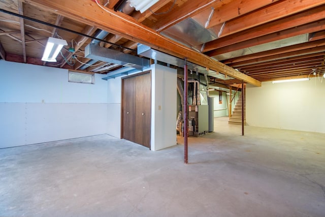 608 Pfau St, Mankato, MN 56001 - unfinished below grade area with heating unit and stairs