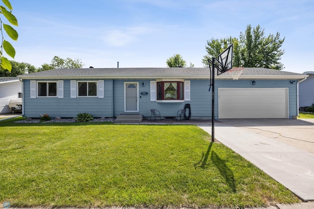 901 7th St W, West Fargo, ND 58078 - ranch-style house featuring a garage, concrete driveway, and a front lawn
