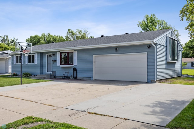 901 7th St W, West Fargo, ND 58078 - ranch-style home with a garage, concrete driveway, and a shingled roof