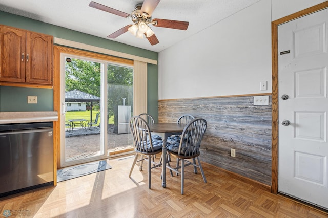 901 7th St W, West Fargo, ND 58078 - dining space featuring wainscoting and a ceiling fan