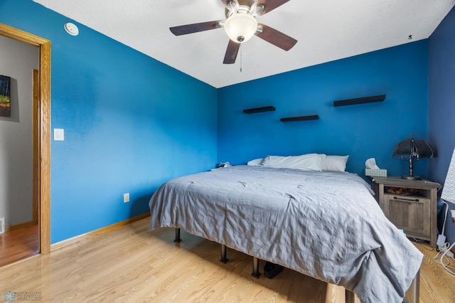 901 7th St W, West Fargo, ND 58078 - bedroom with wood finished floors and ceiling fan