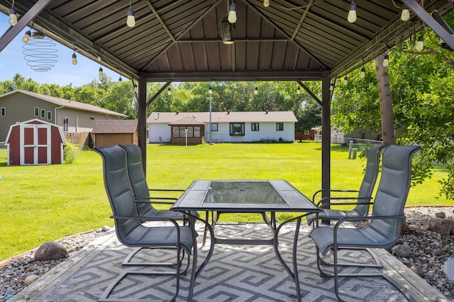 901 7th St W, West Fargo, ND 58078 - view of patio featuring a storage shed and a gazebo
