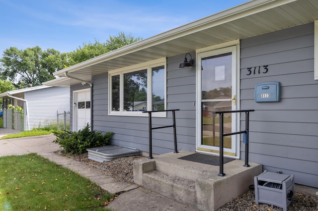 3113 8th St N, Fargo, ND 58102 - property entrance featuring a garage