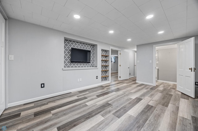 3113 8th St N, Fargo, ND 58102 - finished below grade area featuring wood finished floors and recessed lighting