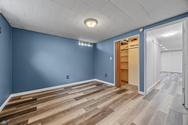 3113 8th St N, Fargo, ND 58102 - unfurnished room featuring wood finished floors and baseboards