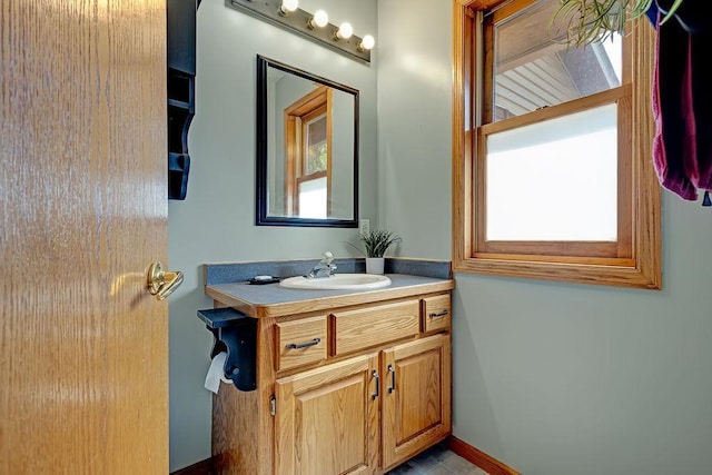 417 Whiskey Rd SW, Isanti, MN 55040 - bathroom featuring vanity and baseboards