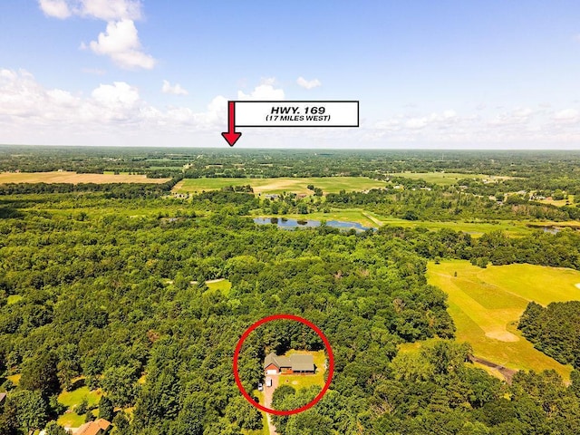 417 Whiskey Rd SW, Isanti, MN 55040 - bird's eye view of a large body of water and a heavily wooded area