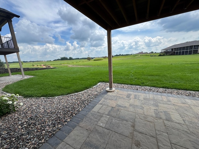 2330 9th St W, Albert Lea, MN 56007 - view of green lawn with a patio area and a view of rural / pastoral area