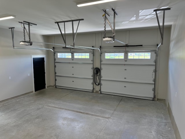 2330 9th St W, Albert Lea, MN 56007 - garage featuring a garage door opener