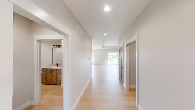 2330 9th St W, Albert Lea, MN 56007 - hall featuring light wood-style flooring and recessed lighting
