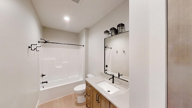 2330 9th St W, Albert Lea, MN 56007 - bathroom featuring vanity, bathing tub / shower combination, and wood finished floors