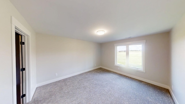 2330 9th St W, Albert Lea, MN 56007 - carpeted empty room with baseboards