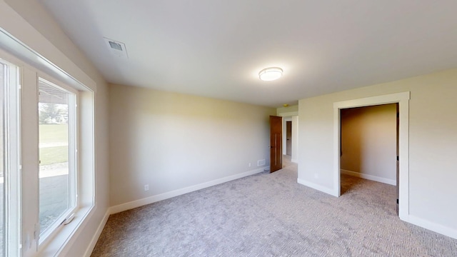 2330 9th St W, Albert Lea, MN 56007 - unfurnished bedroom featuring carpet flooring and baseboards