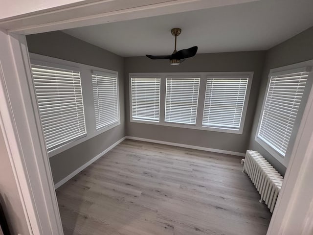 4644 Lyndale Ave S, Minneapolis, MN 55419 - unfurnished sunroom featuring radiator