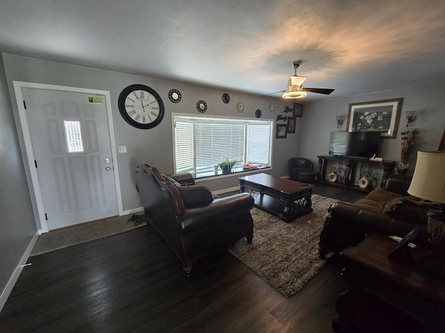 1101 7th Ave SW, Pipestone, MN 56164 - living room with dark wood-style flooring and a ceiling fan