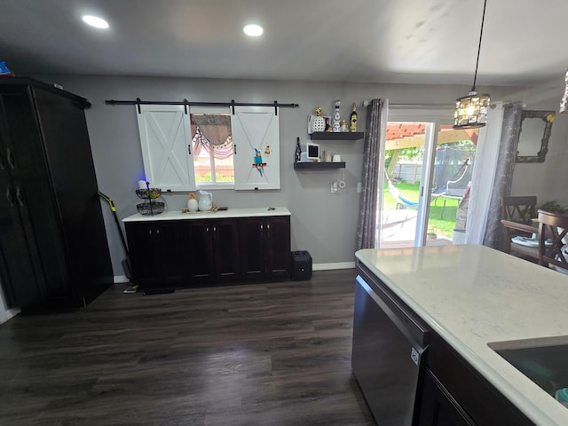 1101 7th Ave SW, Pipestone, MN 56164 - kitchen with dark wood finished floors, dishwasher, a barn door, plenty of natural light, and recessed lighting