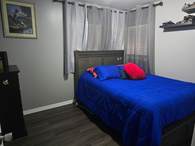 1101 7th Ave SW, Pipestone, MN 56164 - bedroom with wood finished floors and baseboards