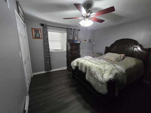 1101 7th Ave SW, Pipestone, MN 56164 - bedroom with dark wood-style floors and ceiling fan