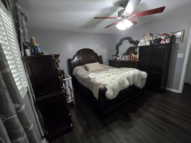 1101 7th Ave SW, Pipestone, MN 56164 - bedroom with dark wood-type flooring and a ceiling fan