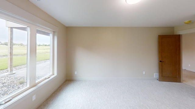 2329 9th St W, Albert Lea, MN 56007 - unfurnished room featuring light colored carpet and a smoke detector