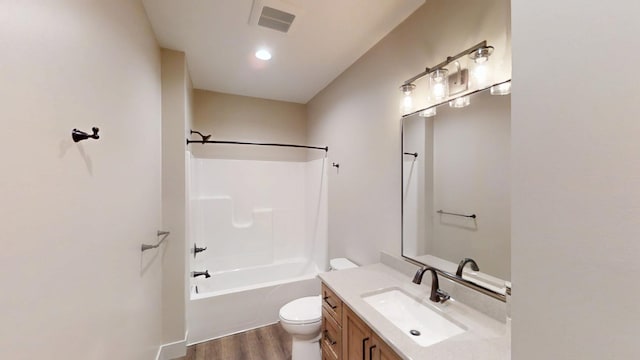 2329 9th St W, Albert Lea, MN 56007 - full bathroom with wood finished floors, vanity, and bathing tub / shower combination